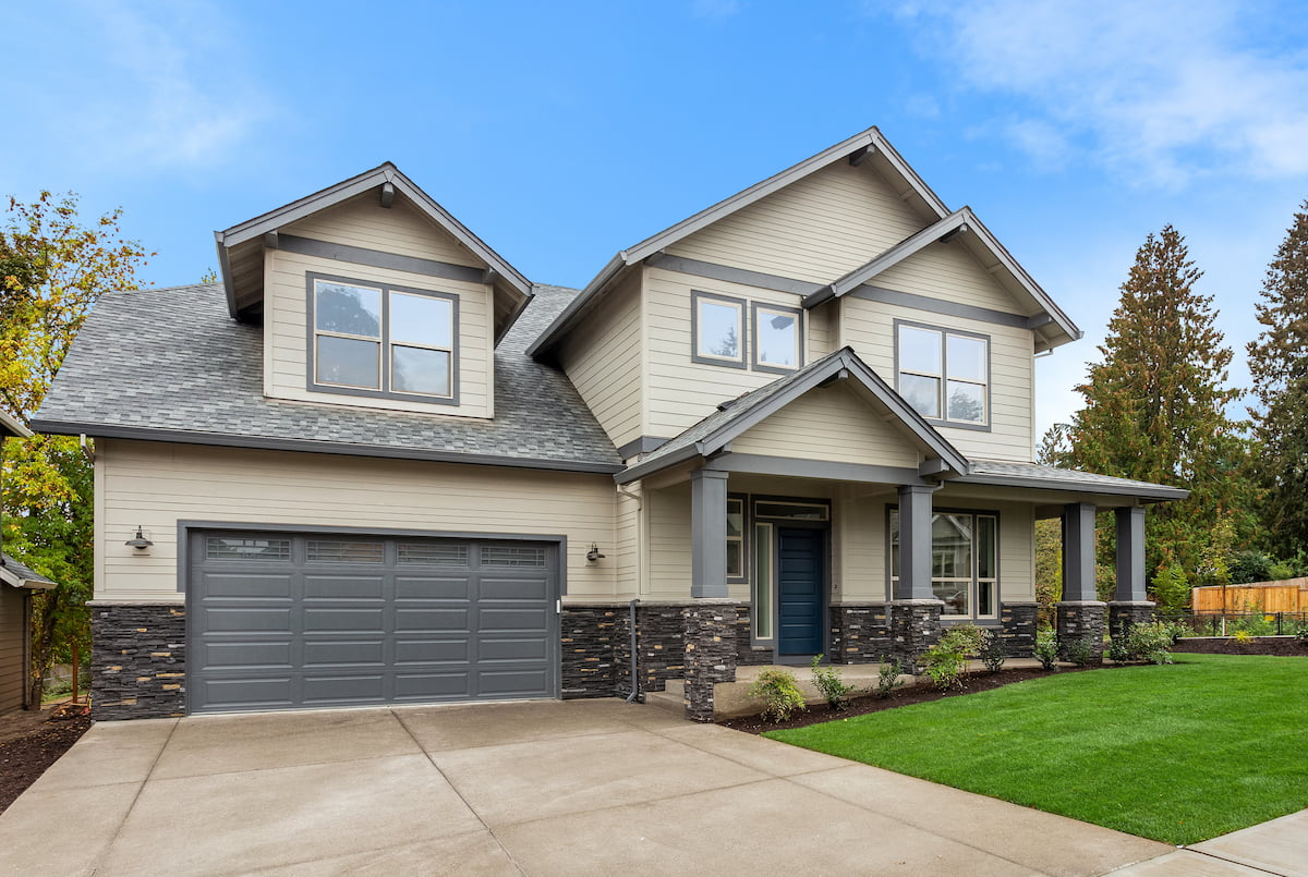 Garage Door Home 2 Front of two-story home with gray garage door