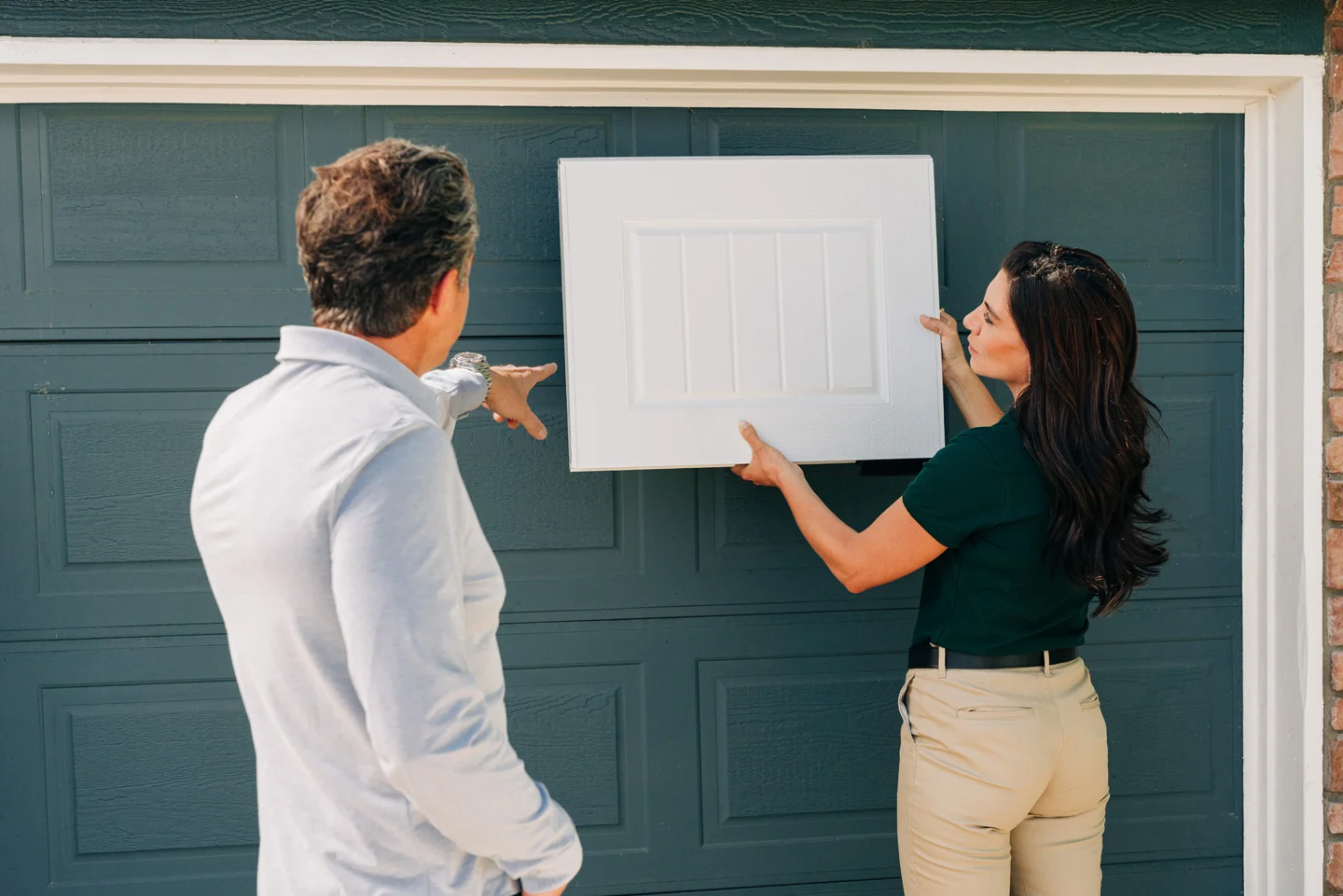 Customer buying a new garage door from Precision Garage Door Customer buying a new garage door from Precision Garage Door